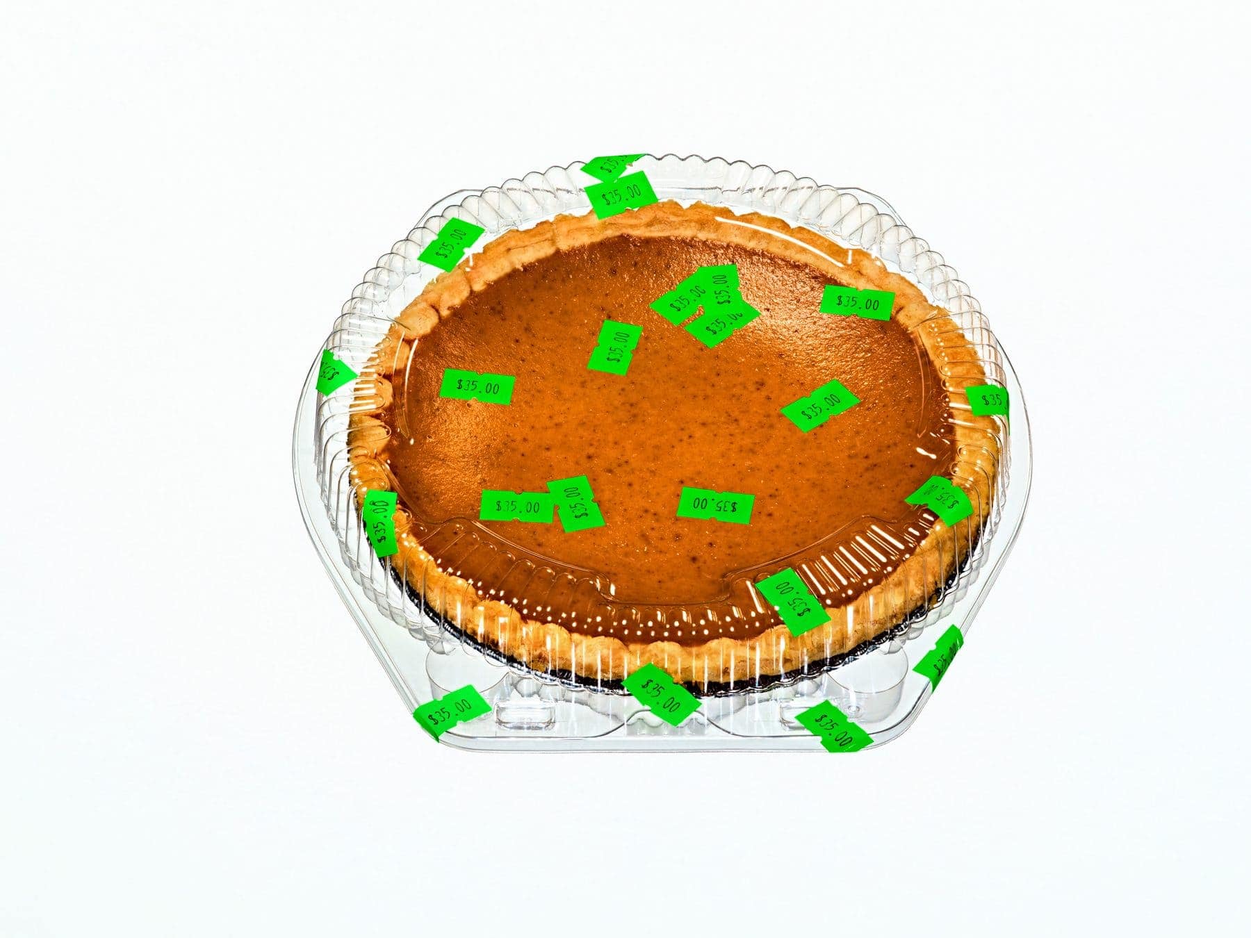 Pumpkin Pie inflated to the size of a person, shot on a bright studio field