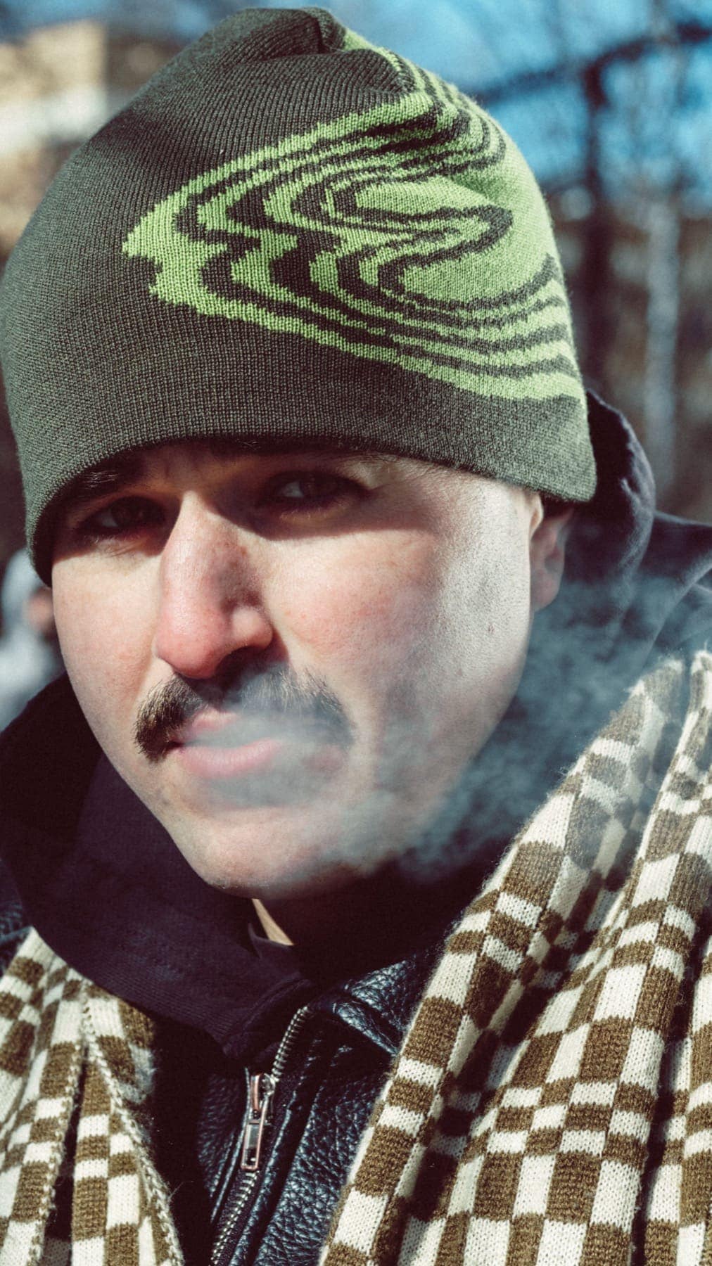 Portrait in the beanie, breath in the cold