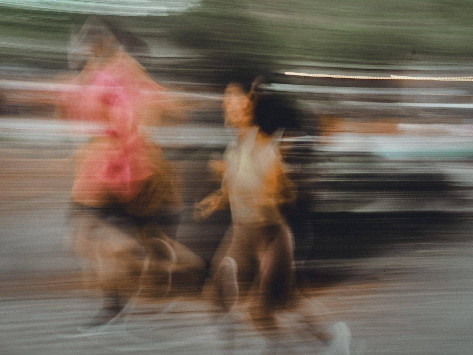 Runners blurred into motion