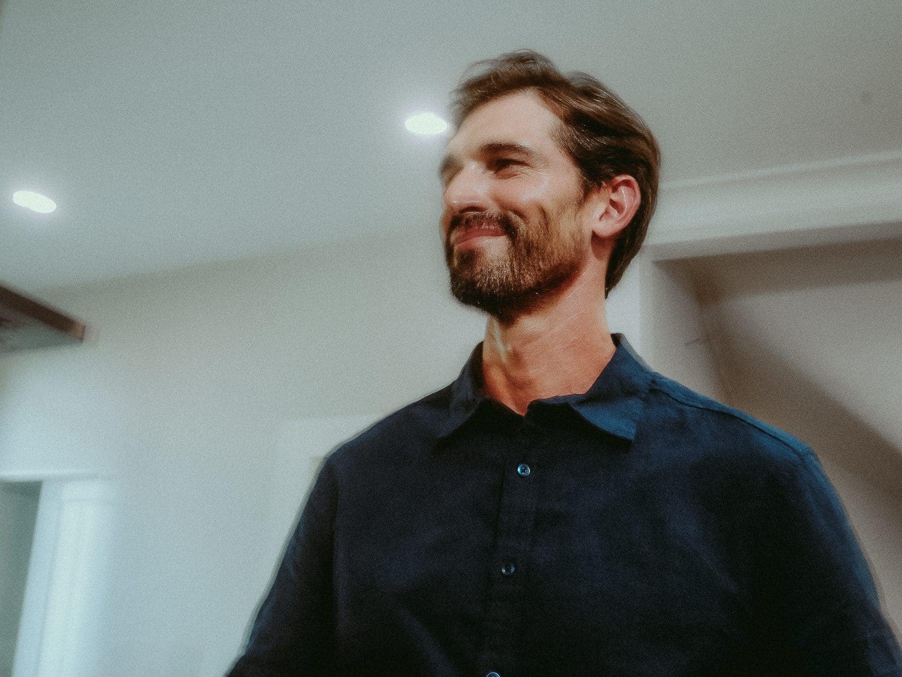A man at home in his apartment