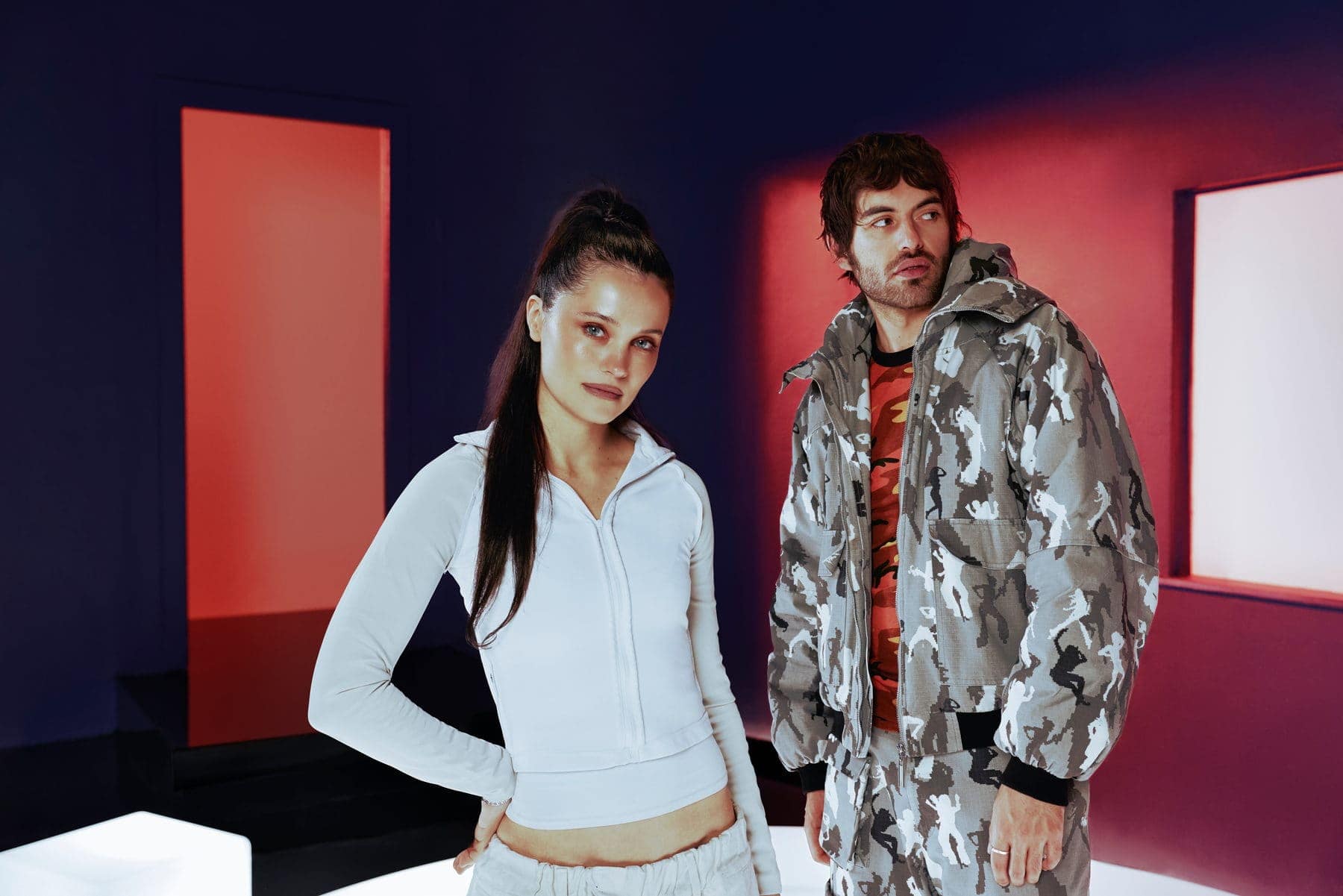 Shanny Wise and Jackson Walker Lewis in front of the red portal window